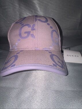 New! Gucci Jumbo GG canvas baseball hat in a light pink and purple colorway.